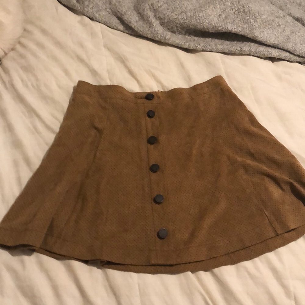 Cute tan sued skirt with buttons. Never worn